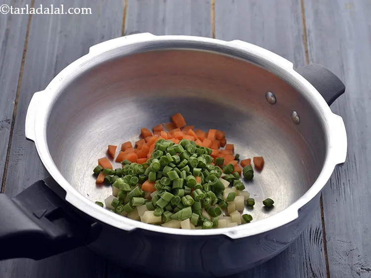 Step 30 – Then add the chopped French beans.&nbsp;