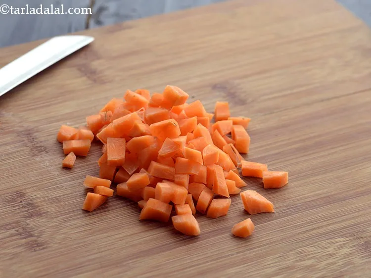 Step 17 – Using a sterilized knife chop the carrots. Keep the chopped carrot aside.&nbsp;&nbsp;