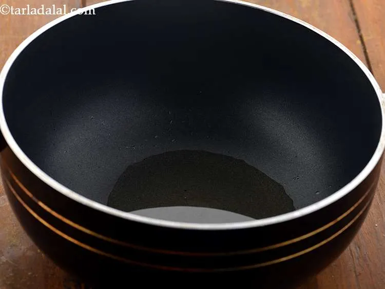 Step 5 – For making the&nbsp;<strong>Potato Bhaji (Aloo Bhaji)</strong>, heat the oil in a broad non-stick pan or …