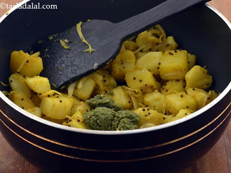 Step 13 – Add the <a href="https://www.tarladalal.com/How-To-Make-Green-Chilli-Paste-42729r" target="_blank">green chilli paste</a>&nbsp;to&nbsp;<strong>Potato Aloo Bhaji</strong>. Finely chopped green chillies can also …
