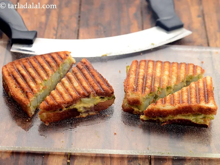 Step 13 – Cut each&nbsp;<strong>potato cheese grilled sandwich | grilled aloo cheese sandwich | Indian potato cheese grilled …