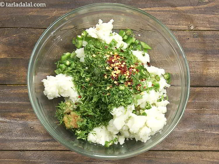 Step 9 – Add red chilli flakes. Potatoes being a very bland ingredient, we are making use of …