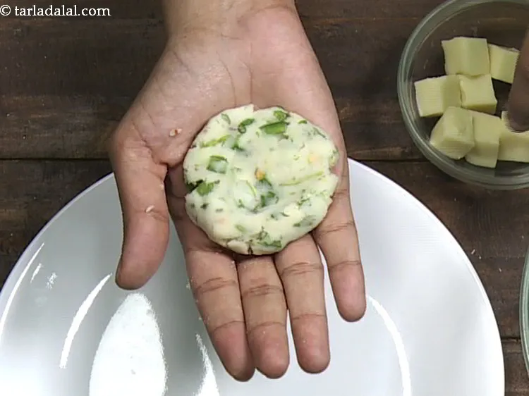 Step 14 – Shape a portion into a flat round.