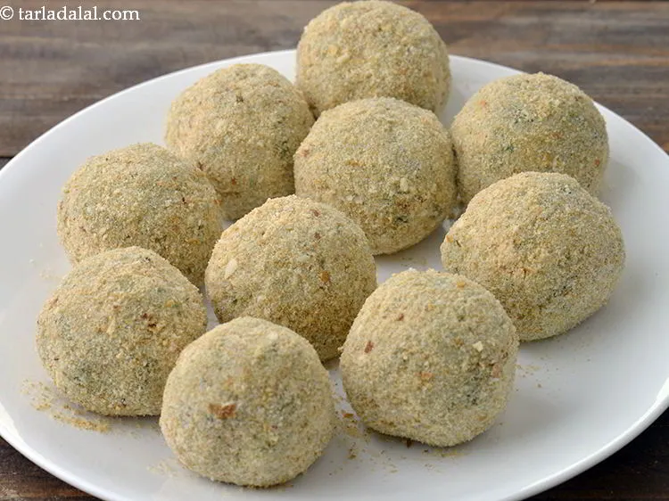 Step 20 – Repeat the dipping and coating process to prepare all the 10 <strong>potato cheese stuffed balls</strong>. …