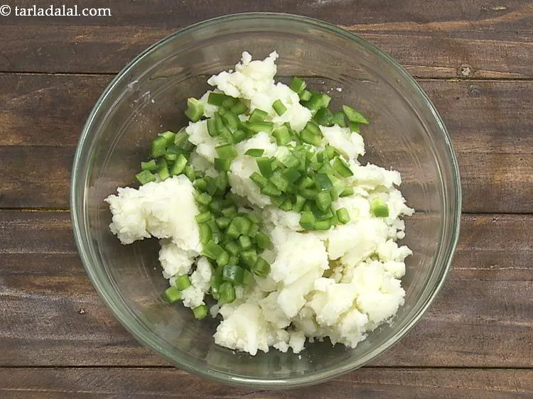 Step 5 – Add capsicum. They give a nice colour and crunch to the <strong>potato cheese-stuffed balls</strong>. Other …