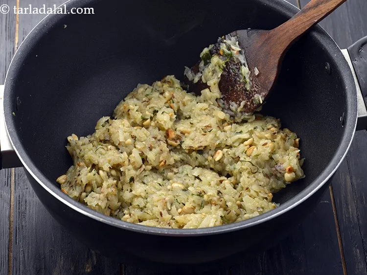 Step 24 – Mix well and cook on a medium flame for 1 minute.