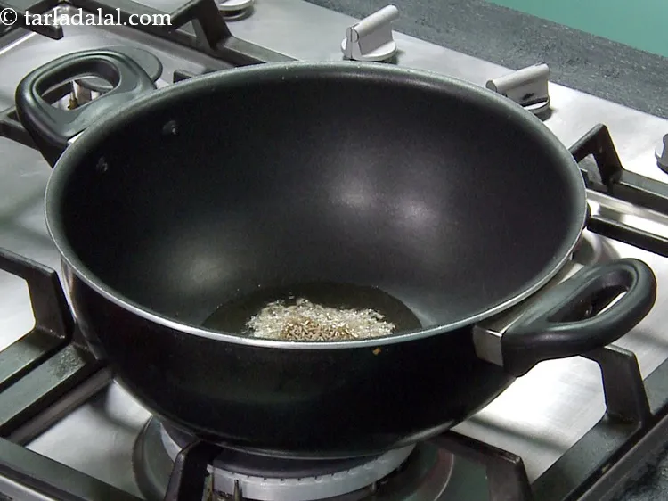 Step 12 – Add 1 tsp&nbsp;<a href="https://www.tarladalal.com/glossary-cumin-seeds-jeera-zeera-381i">cumin seeds (jeera)</a>.