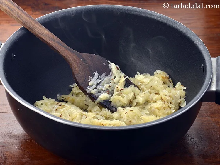 Step 17 – Mix well and cook on a slow flame for 8 minutes, or till the potatoes …