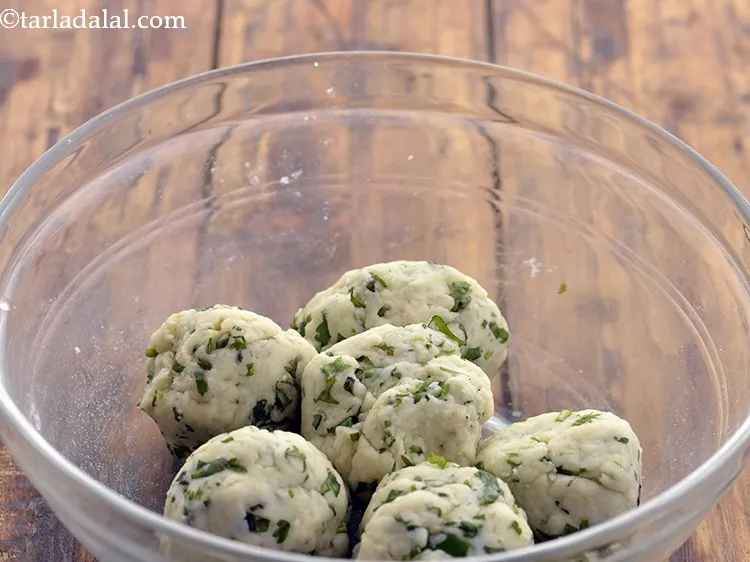 Step 10 – To make the <strong>Potato Roti</strong>, divide the dough into 6 equal portions.