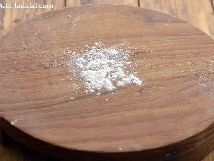 Step 11 – Put a little flour on the rolling board.&nbsp;