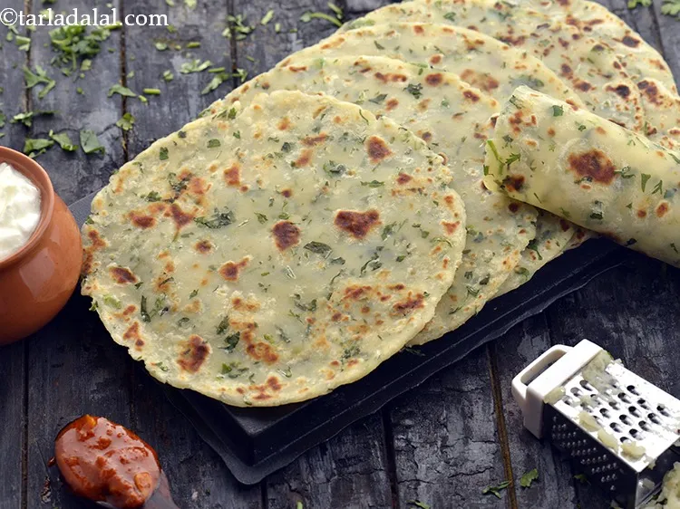 Step 18 – Serve the <strong>Potato Roti</strong> immediately with curds and pickle of your choice