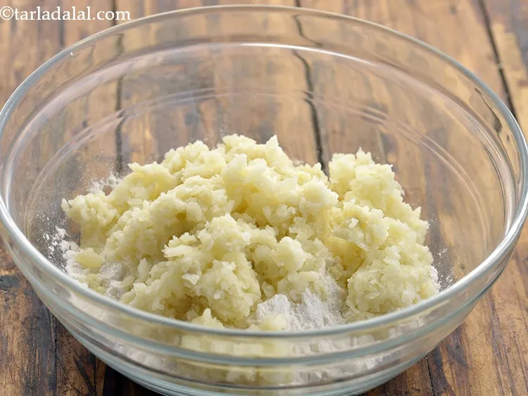 Step 4 – Add grated potatoes.
