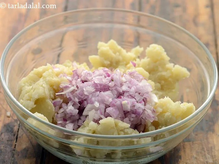 Step 3 – Add finely chopped onions. Onions will add crunch to our sandwich.