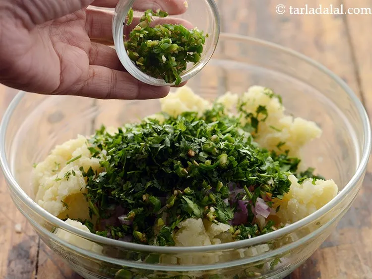 Step 5 – Add green chillies, adjust it according to your preference of spice.&nbsp;