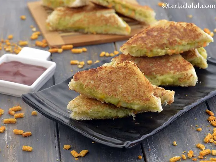 Step 22 – Serve immediately with tomato ketchup and wafers.