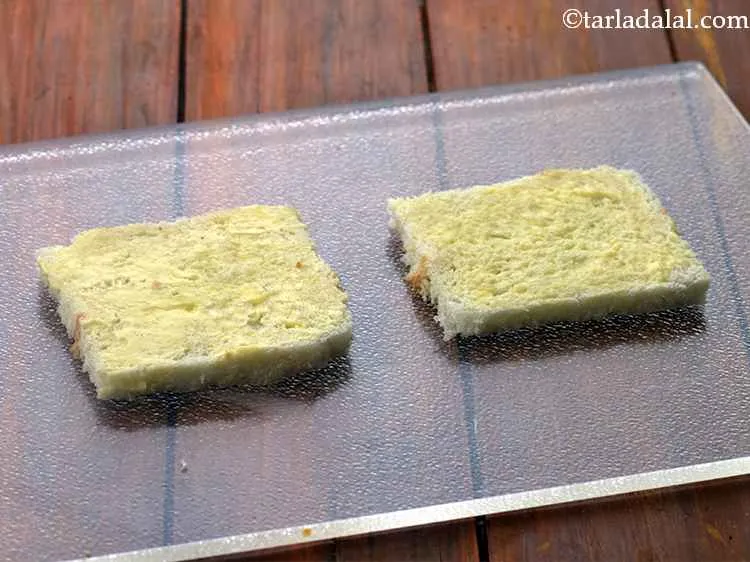 Step 12 – Apply ? tsp of butter on each bread slice.