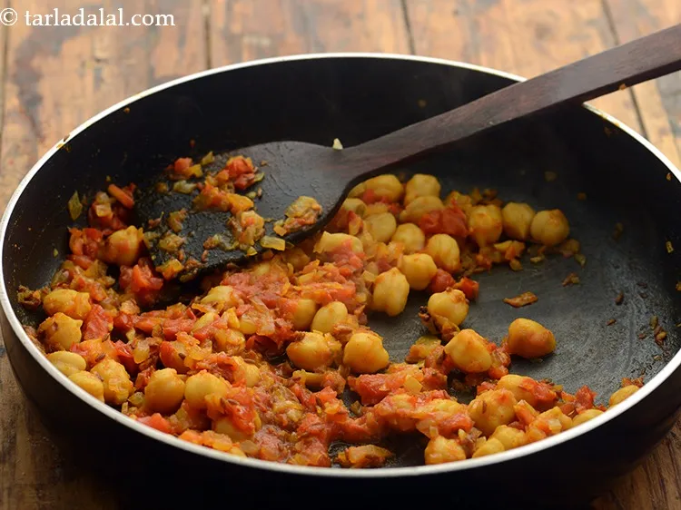 Step 13 – Mix well and cook on a medium flame for 1 minute.&nbsp;