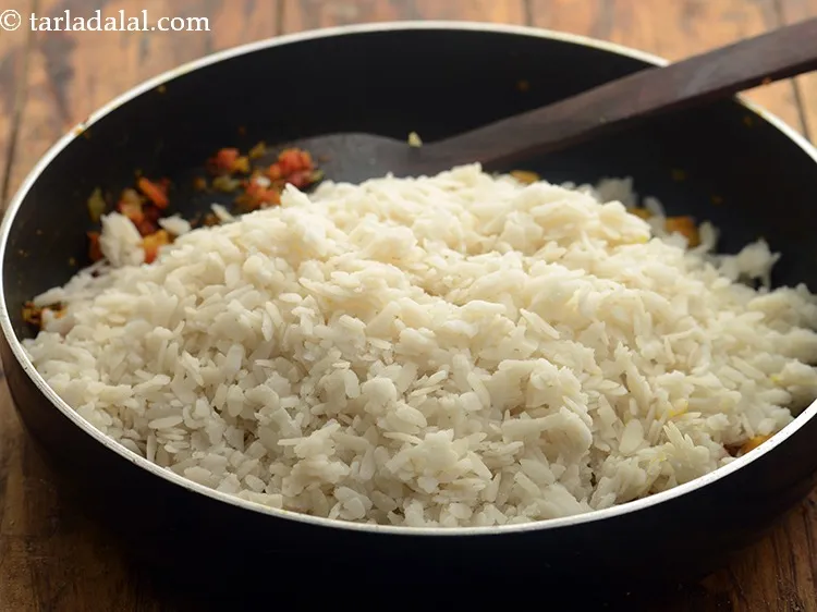 Step 14 – Add the soaked beaten rice for&nbsp;<strong>protein rich breakfast&nbsp;</strong>.&nbsp;