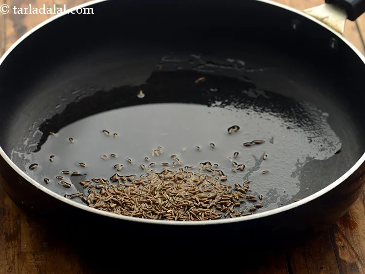 Step 5 – Add cumin seeds and let them crackle.&nbsp;