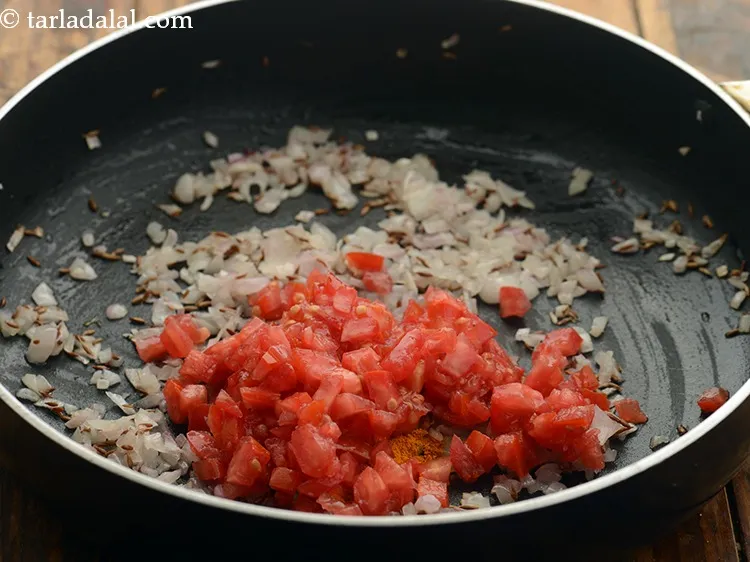 Step 8 – Add tomatoes. Tomatoes will add a nice flavor to poha and make it even tastier.&nbsp;