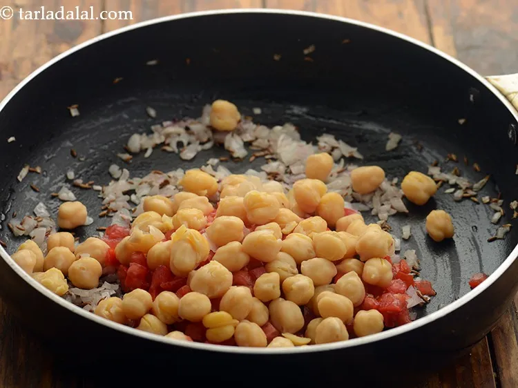 Step 9 – Add soaked and boiled kabuli chana. Kabuli chana makes the dish protien rich as it …