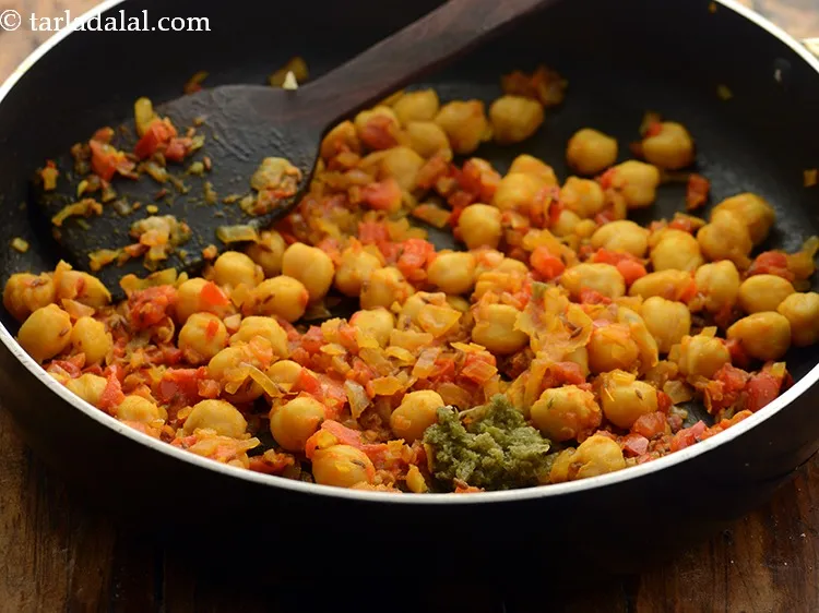 Step 11 – Add green chilli paste to add spice to your <strong>power poha</strong>.&nbsp;