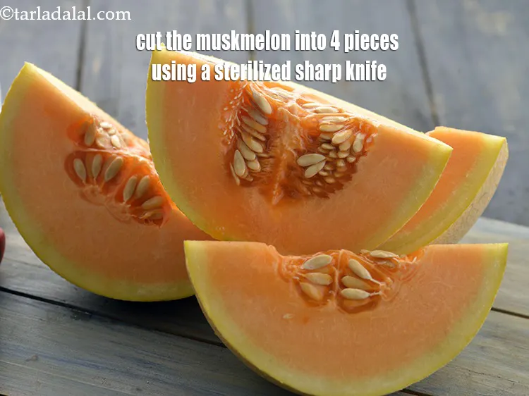 Step 6 – <meta charset="UTF-8" />Cut the muskmelon into 4 pieces using a sterilized sharp knife.&nbsp;<br /> &nbsp;