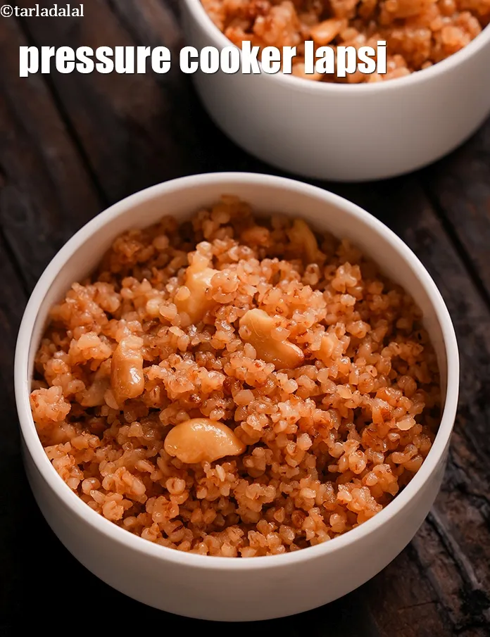 Step 18 – Your <strong>pressure cooker lapsi | pressure cooker broken wheat dessert |</strong> is ready. Serve hot …