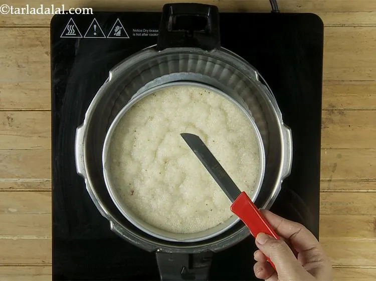 Step 17 – Open the lid and check the cake with help of a knife. If it comes …