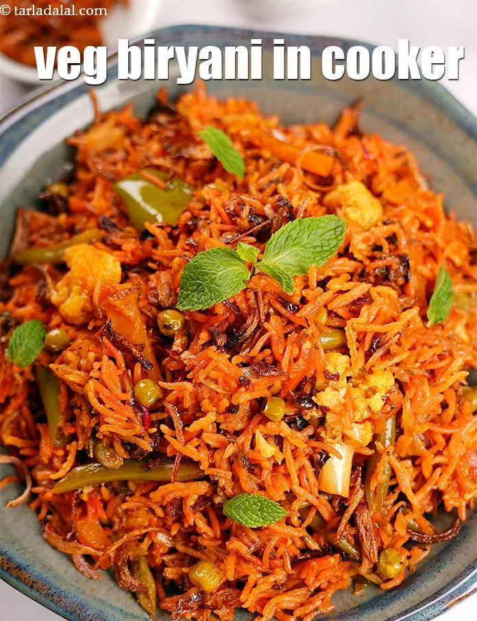 Step 42 – Serve <strong>pressure cooker veg biryani</strong> hot with raita and pickle of your choice.