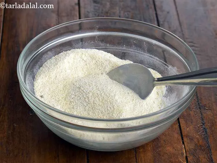 Step 1 – In a deep bowl, take semolina. We have used fine quality rava for the <strong>sooji …