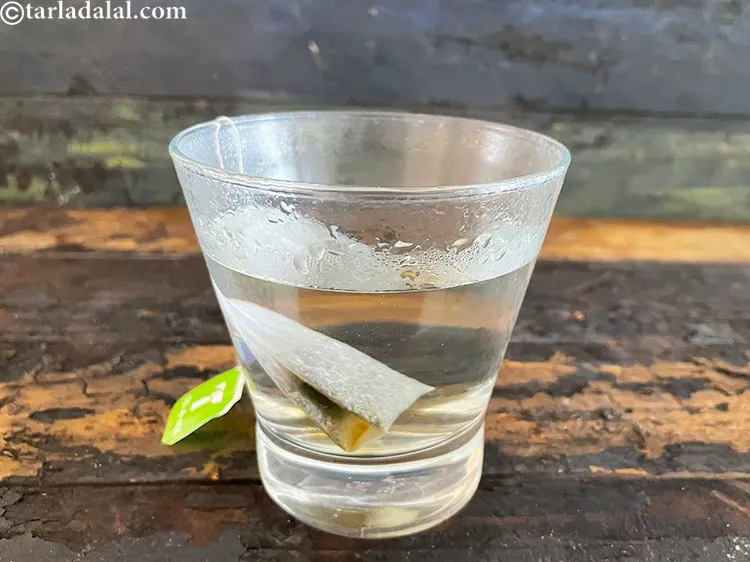 Step 12 – Place green tea bag in the glass.