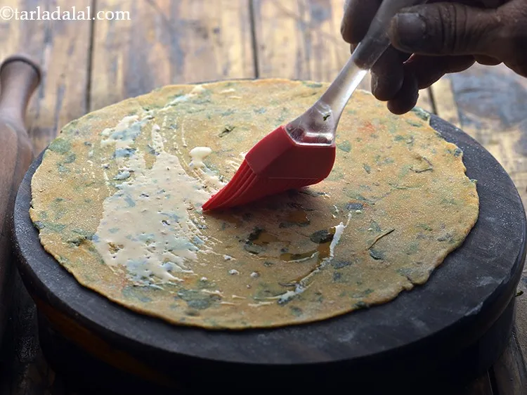 Step 16 – Grease it evenly using a little oil. To make a restaurant style pudina paratha, you …