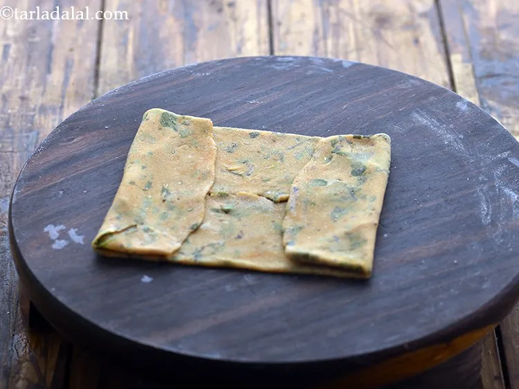 Step 18 – Now fold the other 2 opposite corners similarly to make a square envelope.