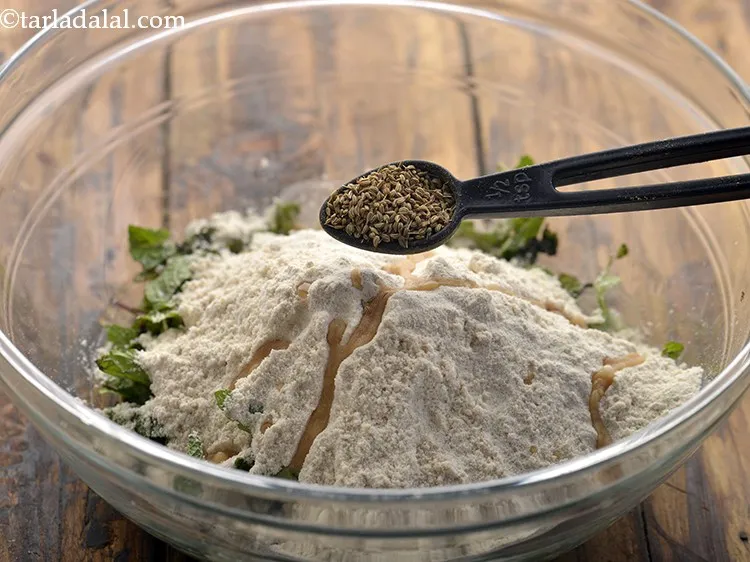 Step 9 – Add the ajwain. Crush them lightly between your palms before adding to get the most …