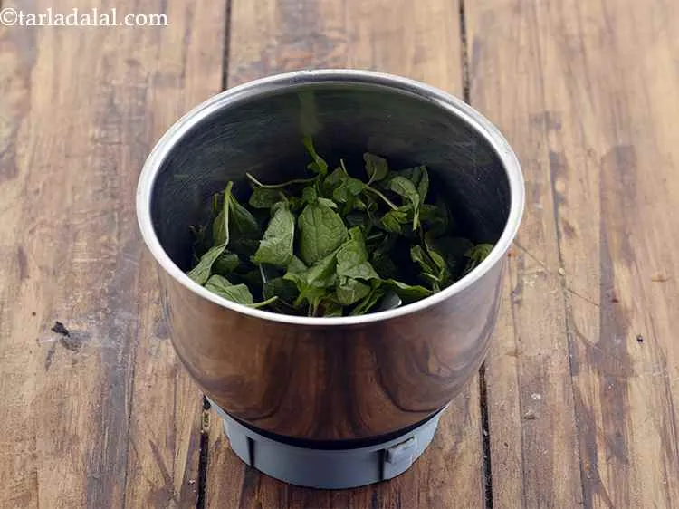 Step 4 – In a mixer jar, take the mint leaves. Mint leaves not only aid in digestion …