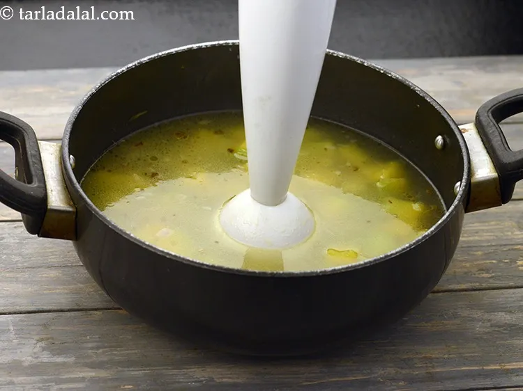 Step 28 – Once cooled, blend using a hand blender to a smooth mixture. Ensure there are no …