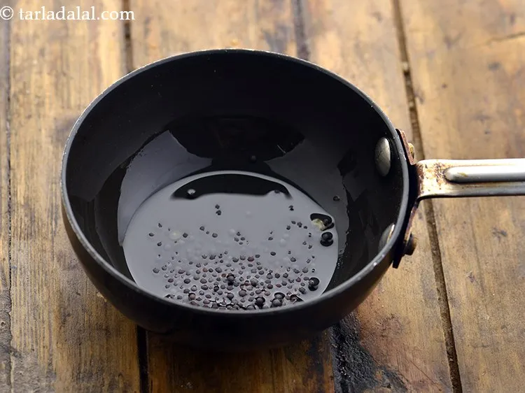 Step 12 – Add 1 tsp&nbsp;<a href="https://www.tarladalal.com/glossary-mustard-seeds-sarson-rai-sarson-ke-beej-525i">mustard seeds ( rai / sarson)</a>.