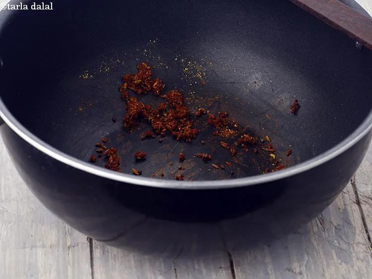 Step 35 – Add the cumin seeds, fennel seeds, coriander powder, chilli powder and 2 tsp of water, …