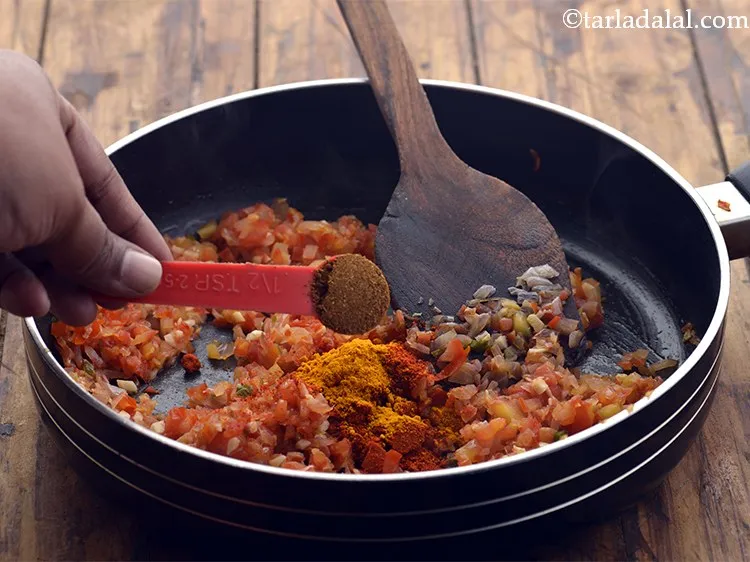 Step 14 – Add garam masala. We have used <a href="https://www.tarladalal.com/Garam-Masala-163r" target="_blank">homemade Punjabi garam masala</a>&nbsp;for this aloo sabzi …