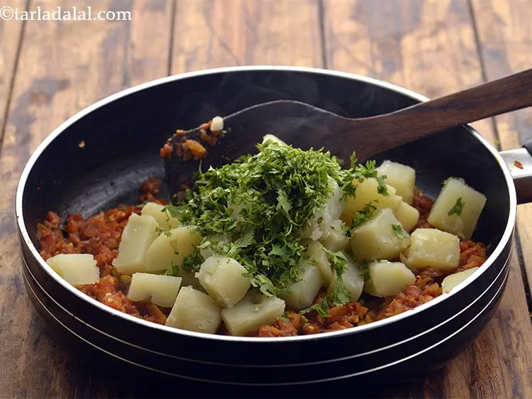 Step 19 – Add coriander.