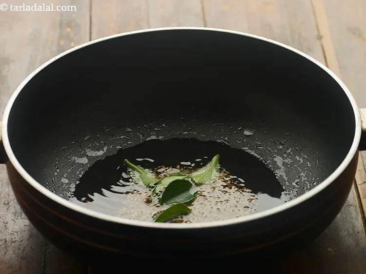 Step 8 – Add curry leaves.
