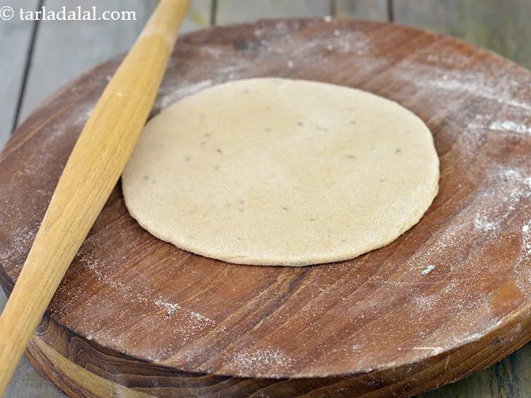 Step 30 – Roll out a portion of the dough into a 125 mm. (5&quot;) diameter circle using …