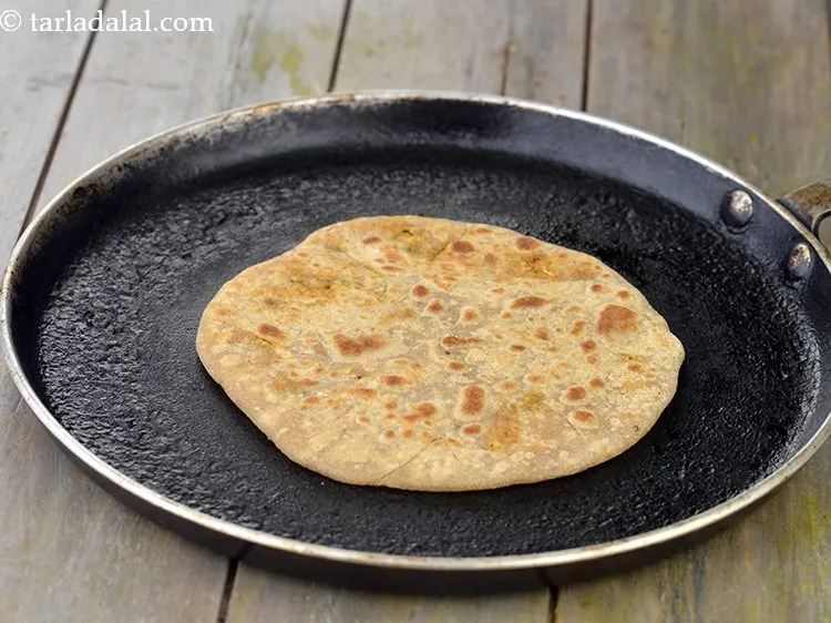 Step 34 – Heat a non-stick tava (griddle) and cook the <strong>Punjabi mooli stuffed paratha recipe | radish …