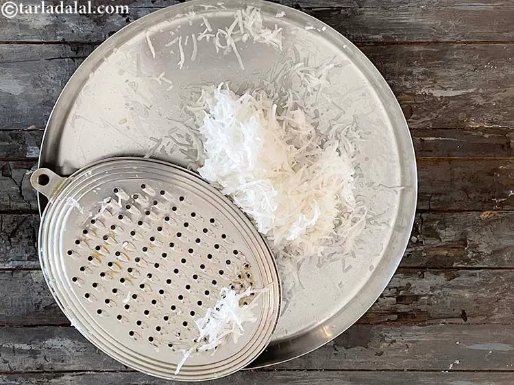 Step 8 – Add 1 1/2 cups&nbsp;<a href="https://www.tarladalal.com/glossary-grated-radish-953i">grated radish (mooli)</a>&nbsp;in a deep bowl