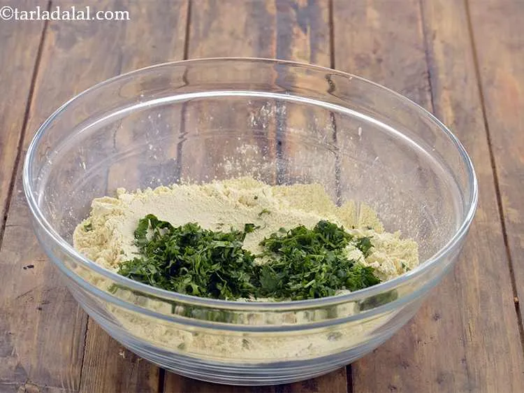 Step 2 – Add the coriander to this. It is fresh, cleaned and finely chopped.