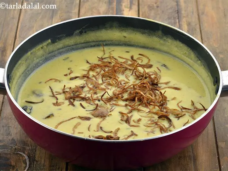 Step 21 – Just before serving, re-heat the&nbsp;<strong>Punjabi pakora kadhi | kadhi pakora |&nbsp;&nbsp;Punjabi pakoda kadhi |</strong>&nbsp;on a …