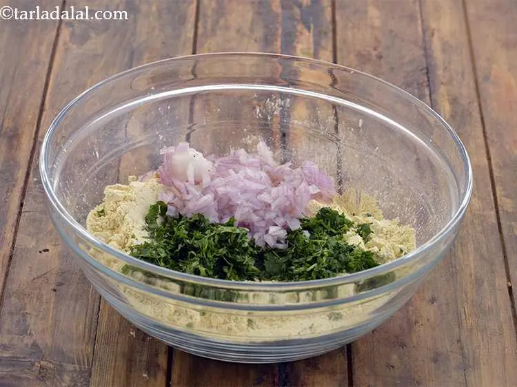 Step 3 – Add the onions. This will give a nice crunch to these pakodas.