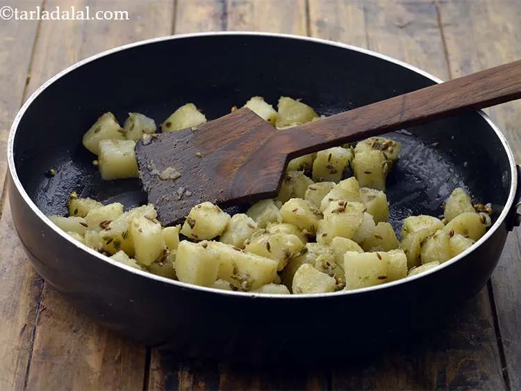 Step 12 – Add the boiled and chopped potato cubes.