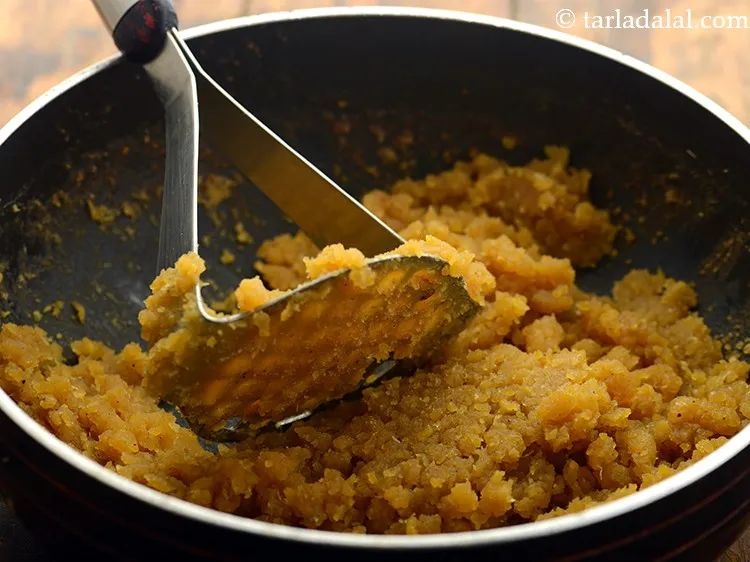 Step 14 – Mash the mixture well with the help of a masher. The&nbsp;<strong>puran poli</strong>&nbsp;mixture should not have …